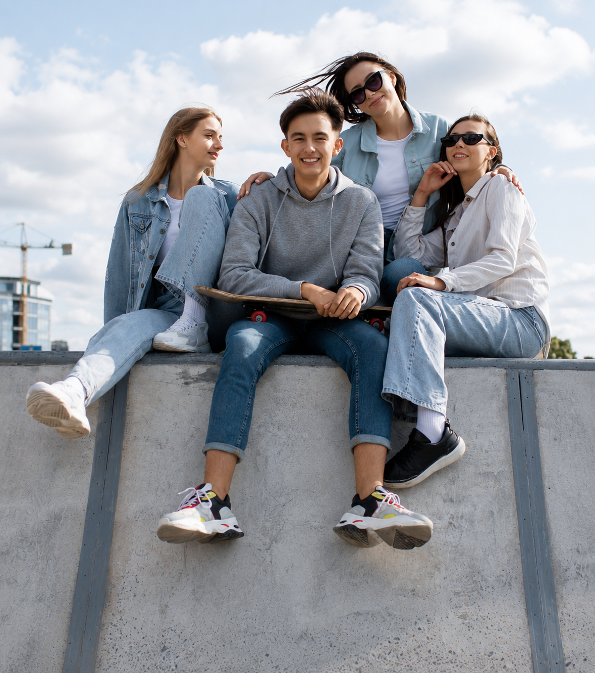 guy_with_skateboard_and_women